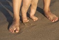 Baby doing his first steps on the beach Royalty Free Stock Photo