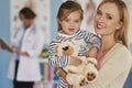 Mother with baby girl at doctor's office Royalty Free Stock Photo