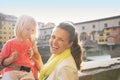 Mother and baby girl eating ice cream in florence Royalty Free Stock Photo
