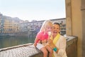 Mother and baby girl eating ice cream near ponte v Royalty Free Stock Photo