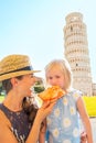 Mother and baby girl eating pizza in pisa Royalty Free Stock Photo