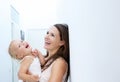 Mother and baby girl laughing together Royalty Free Stock Photo