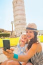 Mother and baby girl making selfie in pisa Royalty Free Stock Photo