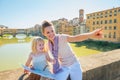 Mother and baby girl with map in florence, italy Royalty Free Stock Photo