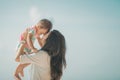 Mother and baby girl playing at seaside Royalty Free Stock Photo