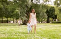 Mother with baby girl walking at summer park Royalty Free Stock Photo