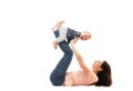 A mother and baby gymnastics, yoga exercises isolated on white background fitness Royalty Free Stock Photo