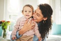 Mother, baby and happiness portrait with a hug in a family home while together for love, support and care. Woman or mom Royalty Free Stock Photo