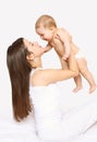 Mother and baby having fun together, mom playing with infant Royalty Free Stock Photo