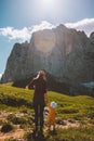 Mother with baby holding hands hiking in mountains family vacation Royalty Free Stock Photo