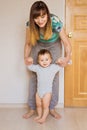 Mother and baby legs. First steps. Royalty Free Stock Photo