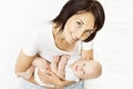 Mother and Baby, Mom Holding Newborn Kid on Hands, Infant Child