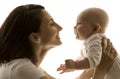 Mother and Baby, Mom Looking to Newborn Child Face to Face Royalty Free Stock Photo