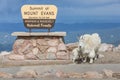 Summit of Mount. Evans sign with Goats