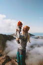 Mother with baby on mountain top family hiking in mountains vacation outdoor cheerful woman with child healthy lifestyle Royalty Free Stock Photo