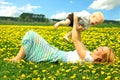 Mother and Baby Playing in Field Royalty Free Stock Photo