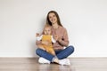 Mother And Baby. Portrait Of Beautiful Young Woman With Cute Infant Child Royalty Free Stock Photo