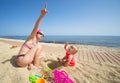 Mother with baby at the seaside Royalty Free Stock Photo