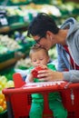 Mother with baby in shopping Royalty Free Stock Photo