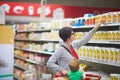 Mother with baby in shopping Royalty Free Stock Photo