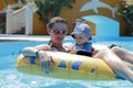 Mother with baby on swim ring Royalty Free Stock Photo