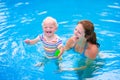 Mother and baby in swiming pool Royalty Free Stock Photo