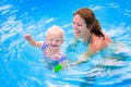 Mother and baby in swiming pool Royalty Free Stock Photo