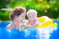 Mother and baby in swiming pool Royalty Free Stock Photo