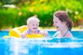 Mother and baby in swiming pool Royalty Free Stock Photo