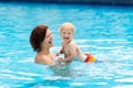 Mother and baby in swimming pool Royalty Free Stock Photo