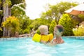 Mother and baby in swimming pool Royalty Free Stock Photo