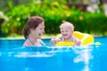 Mother and baby in a swimming pool Royalty Free Stock Photo