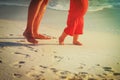 Mother and baby walking on sand beach Royalty Free Stock Photo