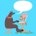 Mother bear by laptop and many flowers