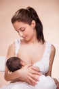 Mother breast feeding her child