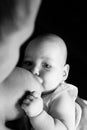 Mother breast feeding a newborn. Baby suckles Royalty Free Stock Photo