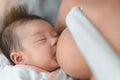 Mother breastfeed baby, Close-up of little asian infant, Breast milk newborn food concept