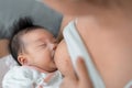 Mother breastfeed baby, Close-up of little asian infant,  Breast milk  newborn food concept Royalty Free Stock Photo