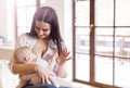 Mother breastfeeding her baby Royalty Free Stock Photo