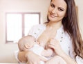 Mother breastfeeding her baby Royalty Free Stock Photo