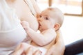 Mother breastfeeding her baby Royalty Free Stock Photo