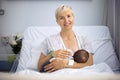 Mother breastfeeding her newborn baby boy in the hospital Royalty Free Stock Photo