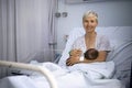 Mother breastfeeding her newborn baby boy in the hospital Royalty Free Stock Photo