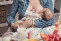 Mother breastfeeding her newborn baby girl Royalty Free Stock Photo
