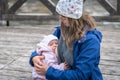 Mother breastfeeding her newborn baby girl in the park Royalty Free Stock Photo