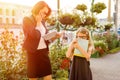 Mother businesswoman takes the child to school. Royalty Free Stock Photo