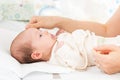 Mother caressing her female newborn baby daughter Royalty Free Stock Photo