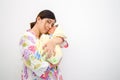 Mother Carrying Her Baby Royalty Free Stock Photo