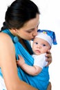 Mother carrying her baby in a sling Royalty Free Stock Photo