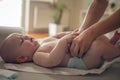 Mother changing diaper baby boy. Royalty Free Stock Photo